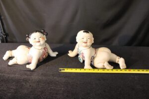 10075